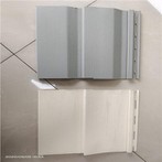 Grijze buitenbekleding van PVC
